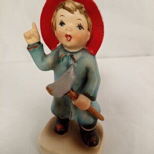Vintage Lefton Porcelain Figurine Little Boy Fireman Model #050 from 1957